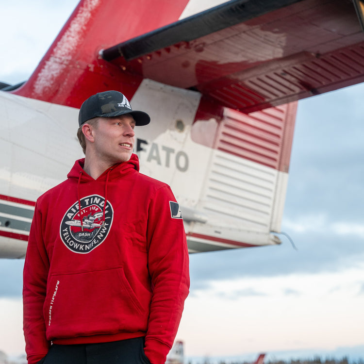 Model wearing an Air Tindi Dash 7 Hoodie