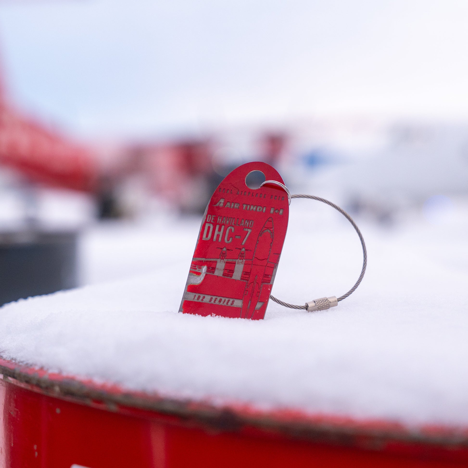 Air Tindi Plane Chain of Dash 7 C-GCPY in Red in the snow