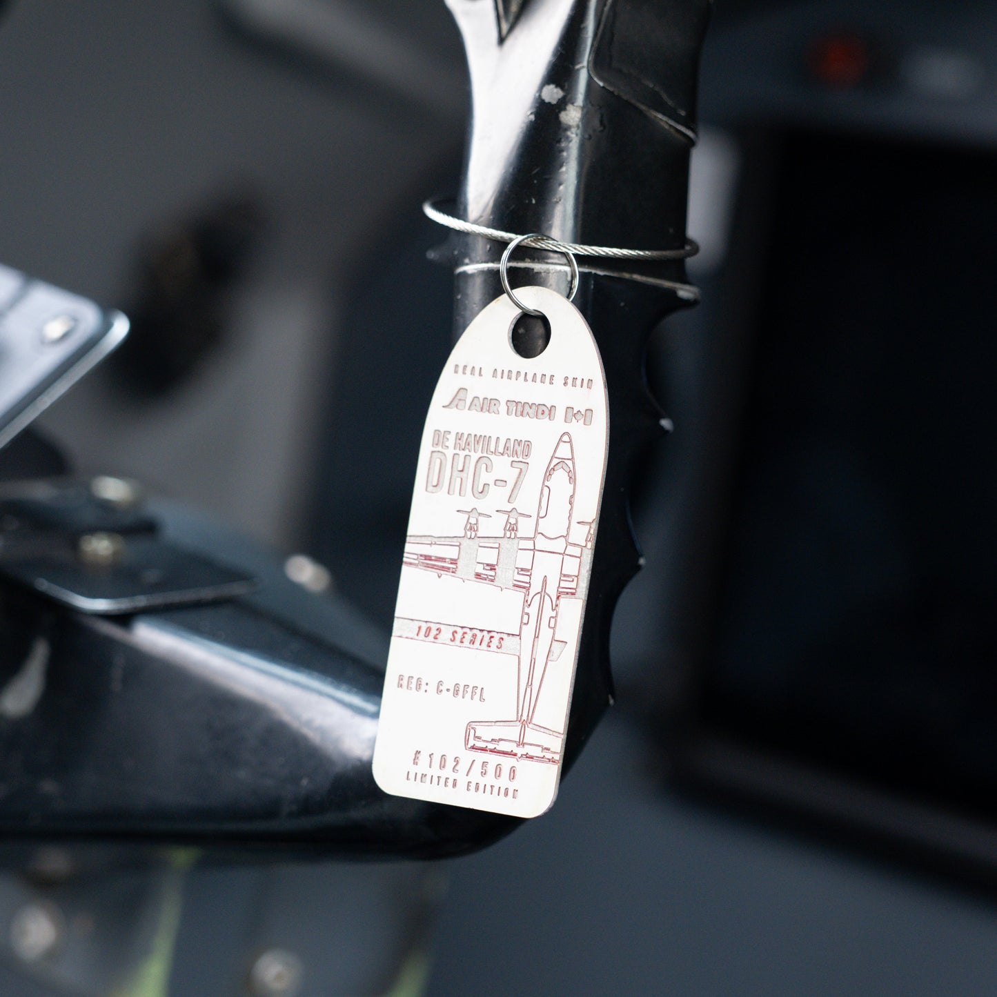 Air Tindi Plane Chain of Dash 7 C-GFFL in Black on a Dash 7 yoke