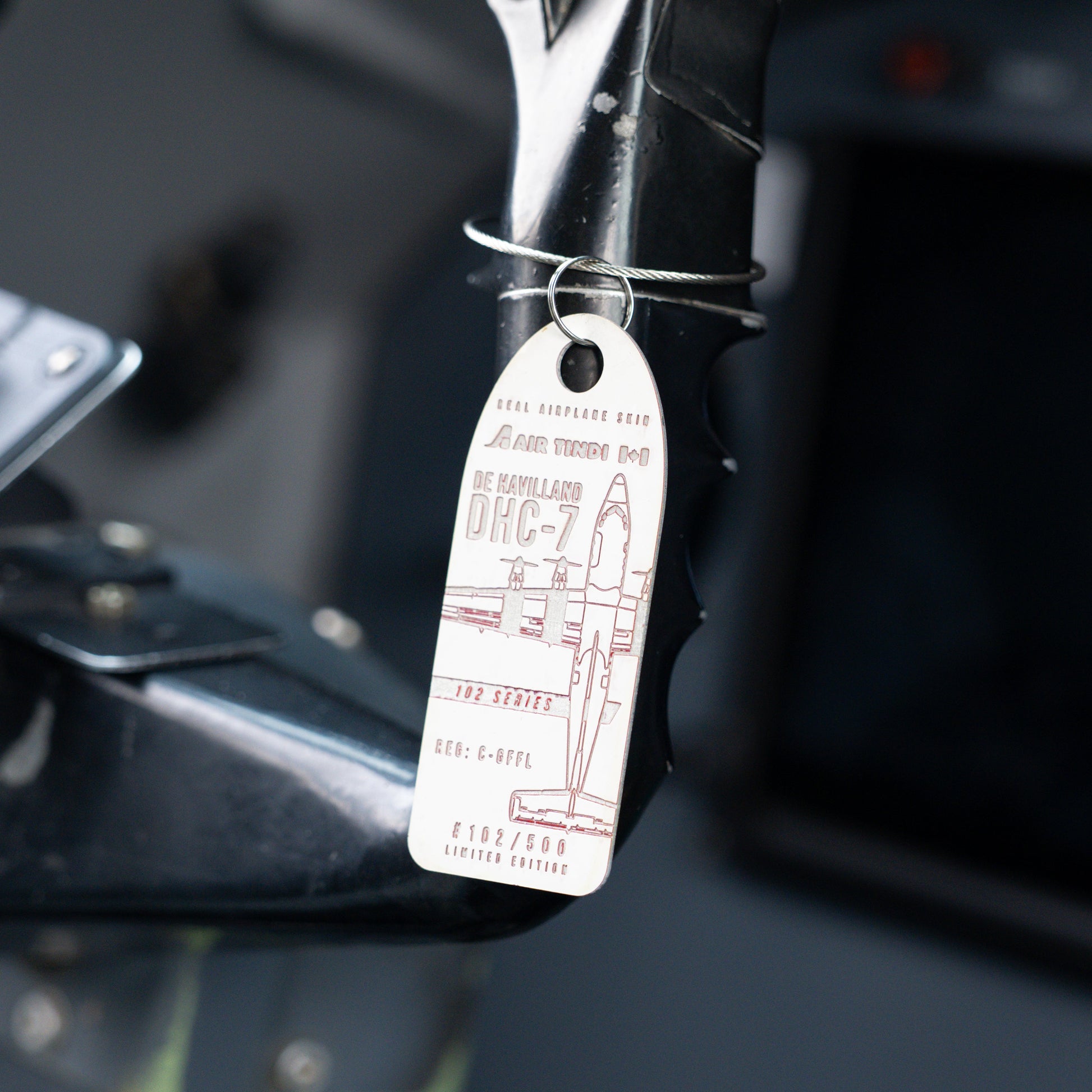 Air Tindi Plane Chain of Dash 7 C-GFFL in Black on a Dash 7 yoke