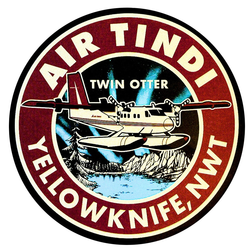 Round Air Tindi Twin Otter sticker featuring a Twin Otter aircraft flying over a northern landscape