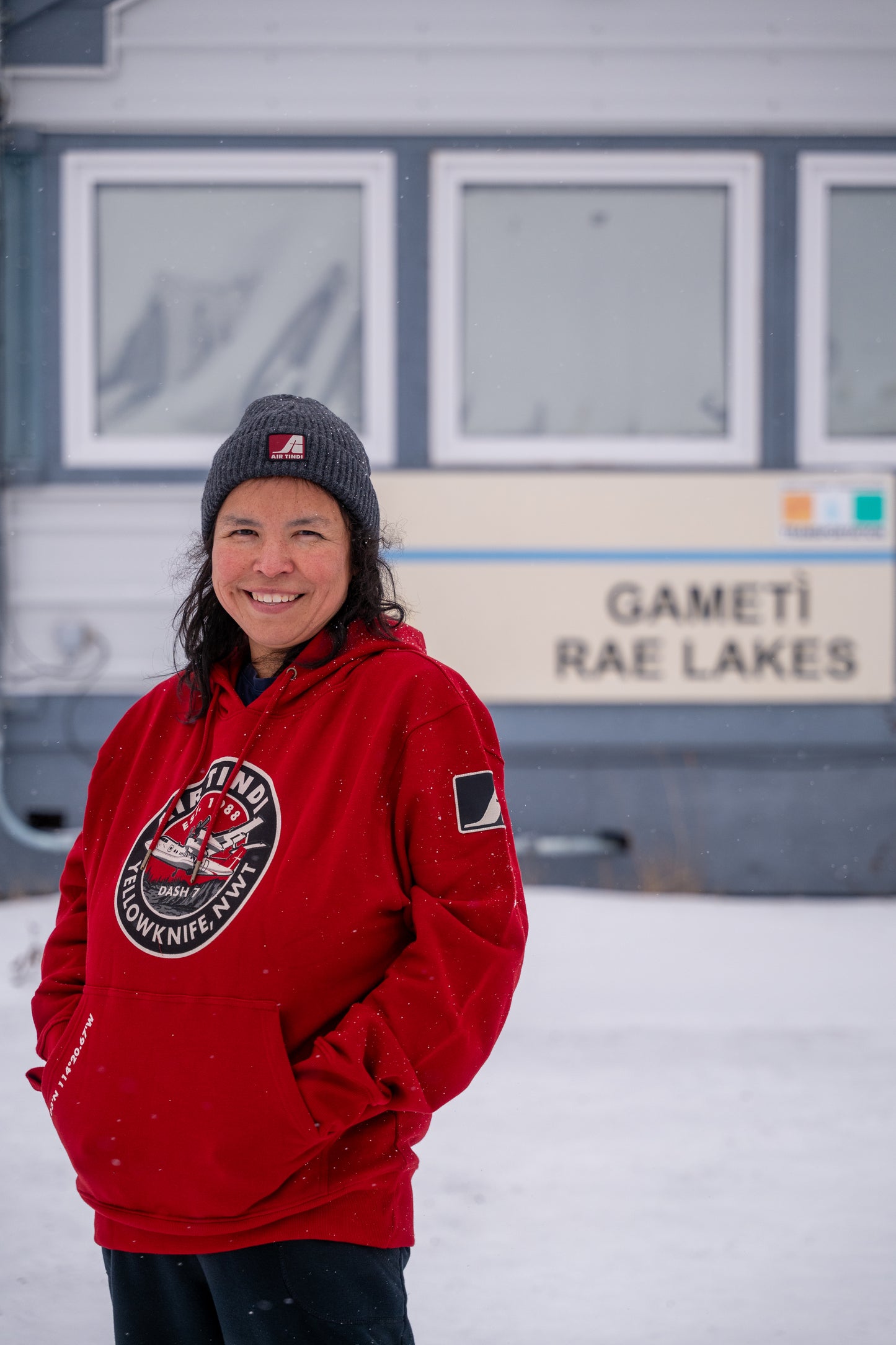 Model wearing an Air Tindi Dash 7 Hoodie