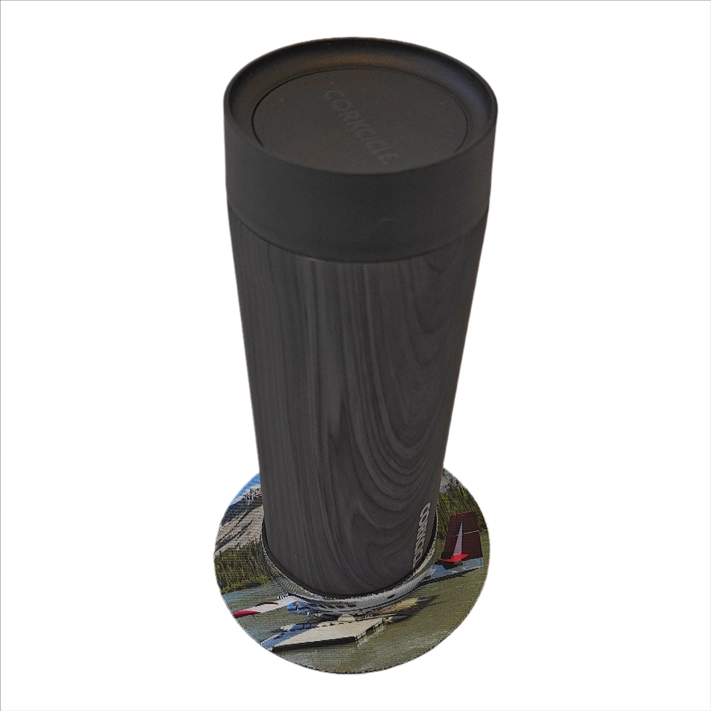 Air Tindi Lil’ Sucker cup holder in Twin Otter Floats securing an Air Tindi Signature Corkcicle Commuter Cup