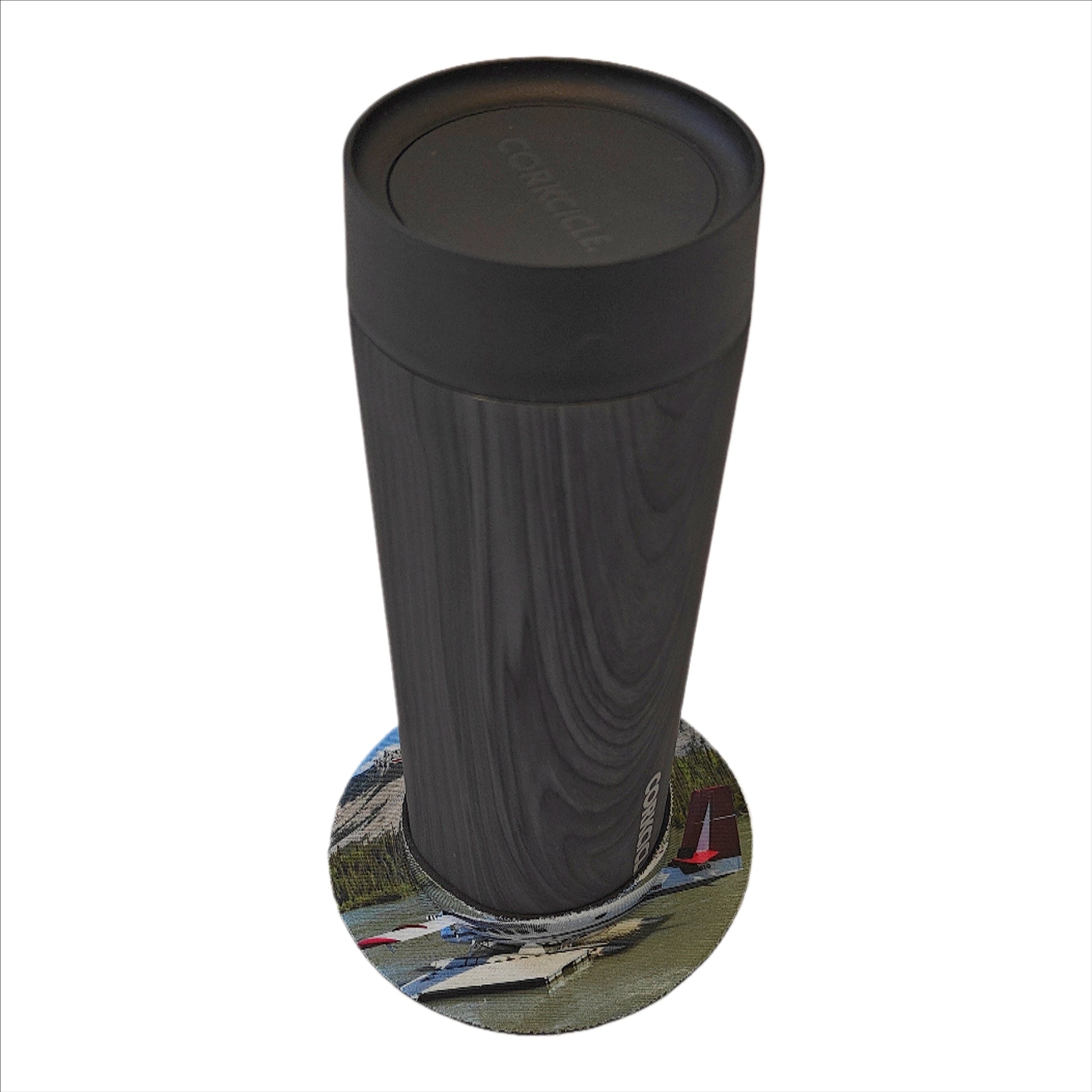 Air Tindi Lil’ Sucker cup holder in Twin Otter Floats securing an Air Tindi Signature Corkcicle Commuter Cup