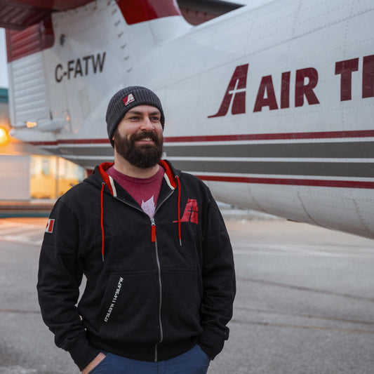 Model wearing an Air Tindi Signature Full Zip Unisex Hoodie with the Essential Wool Winter Toque