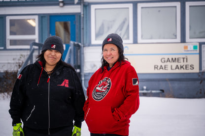 Model wearing an Air Tindi Signature Full Zip Hoodie, alongside another model wearing a Dash 7 Hoodie